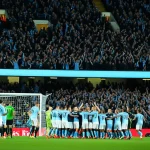 Manchester City players celebrating a goal against Fulham at the Etihad Stadium